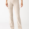 A person is standing against a white background wearing the Sculpted Hayden Cargo Pumice Stone pants from Sanctuary Clothing, featuring pockets and a relaxed fit that flares slightly at the bottom, along with a floral top and light-colored shoes.