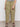 A person wearing Sanctuary Clothing’s area standard rise pant bamboo extended sizing in olive, paired with black strappy sandals, stands against a plain light background. Only the lower half of their body is visible.