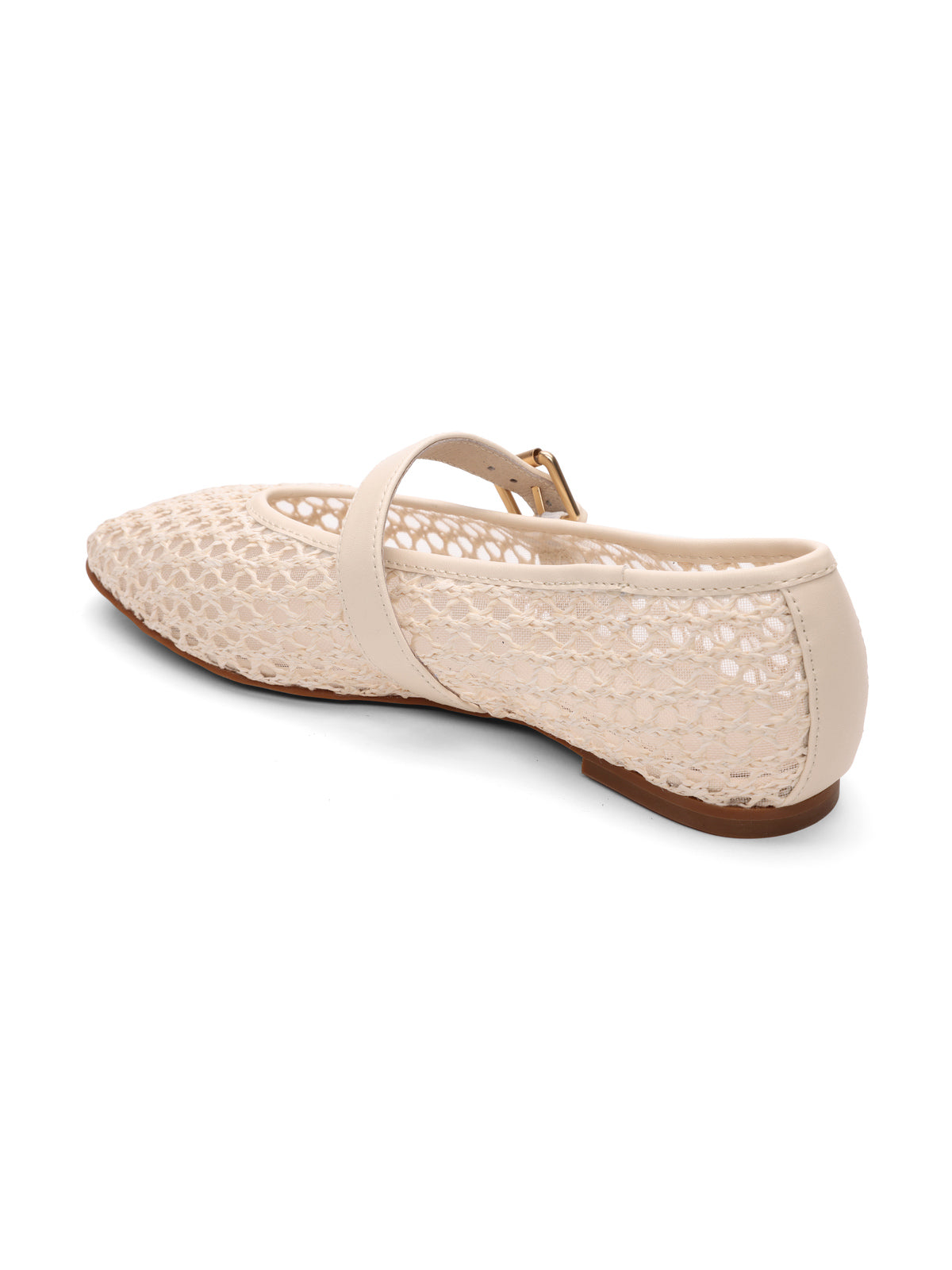 The "Gia Flat Natural" by Sanctuary Clothing is a beige woven shoe featuring a pointed toe, instep strap with buckle, and flat brown sole, with an open, airy design on the sides and toe.