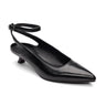 The Magic Pump Black from Sanctuary Clothing is displayed against a white background. It boasts a sleek, minimalistic design with a sharp pointed toe, an elegant ankle strap with a small buckle, and a low block heel.