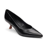 The Padma Pump Black by Sanctuary Clothing is showcased against a plain white backdrop. This black leather pump features a pointed toe and a low, brown kitten heel, boasting a sleek, shiny finish and a simple, elegant design.